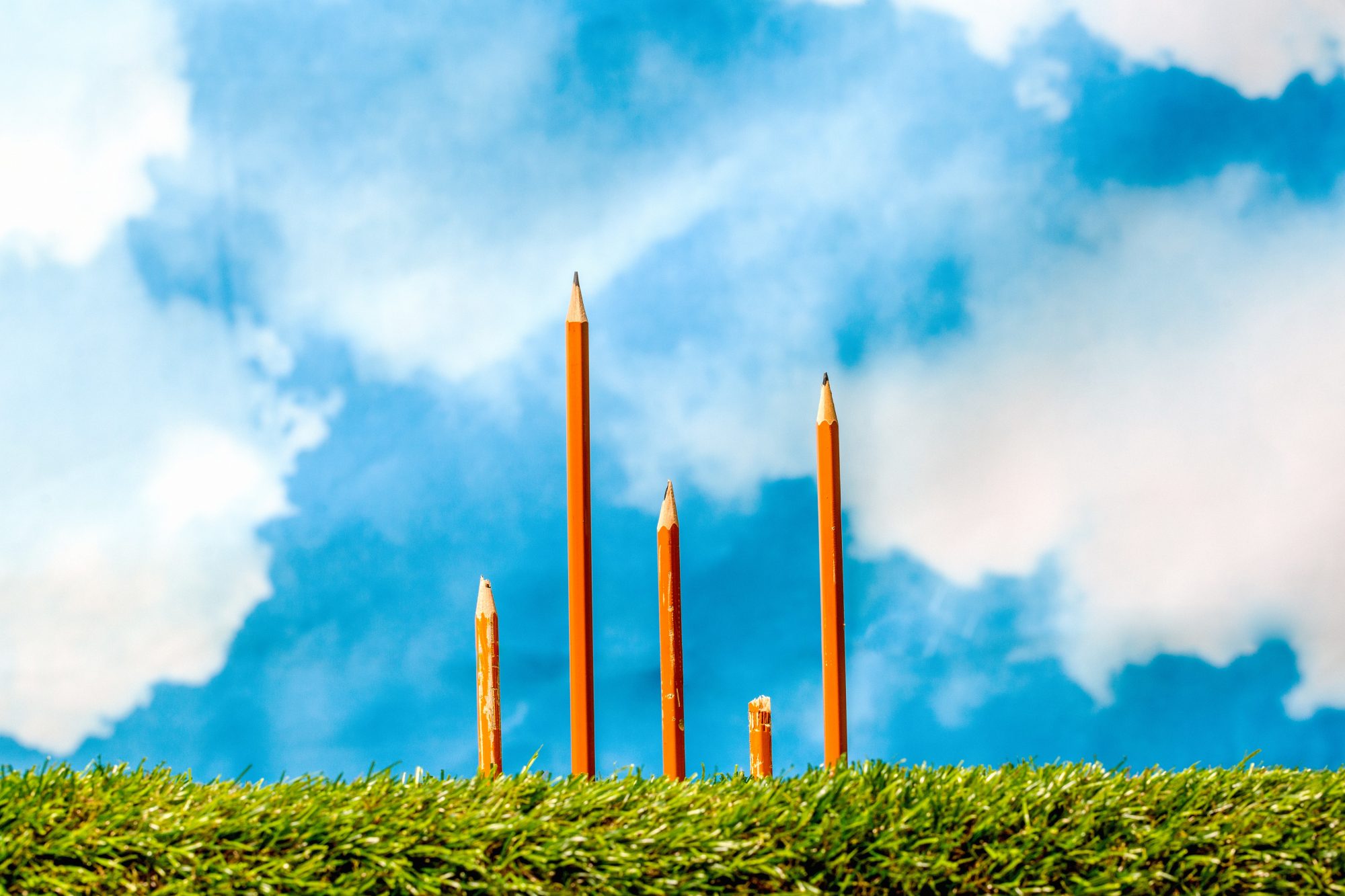 An image of pencils at different heights.