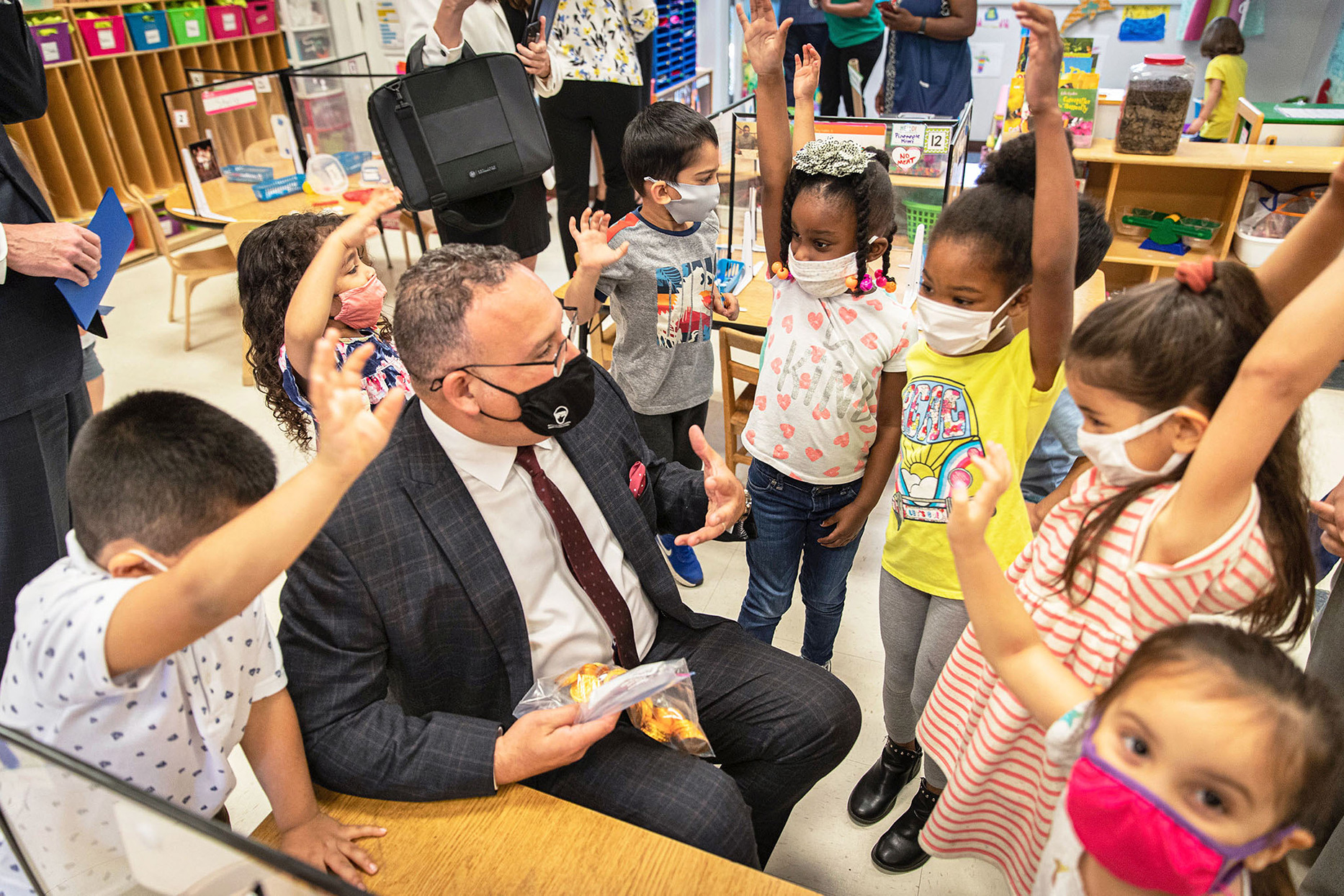 Dr. Miguel Cardona teaching students