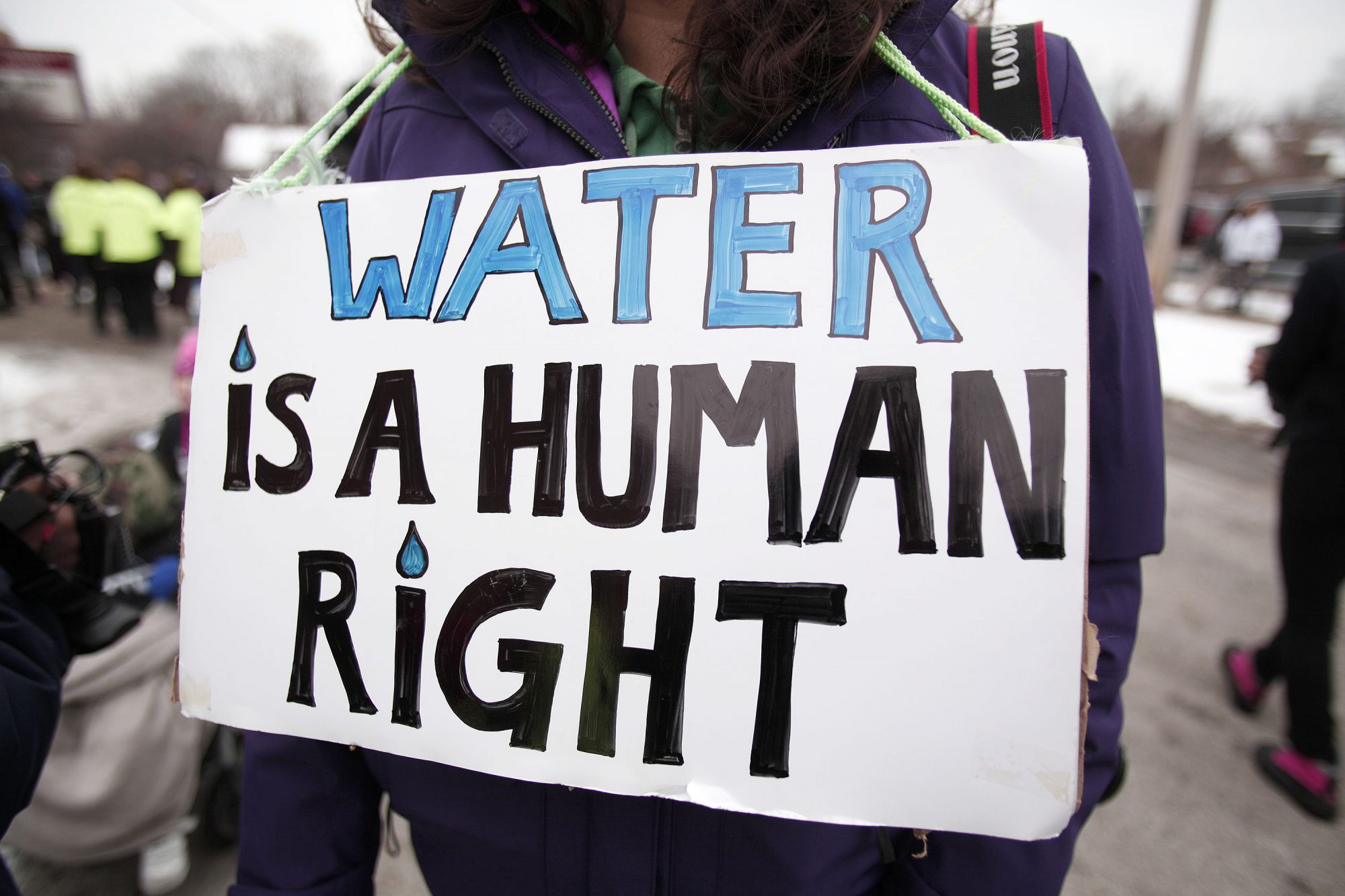 An image of a sign during a march in Flint, Michigan.