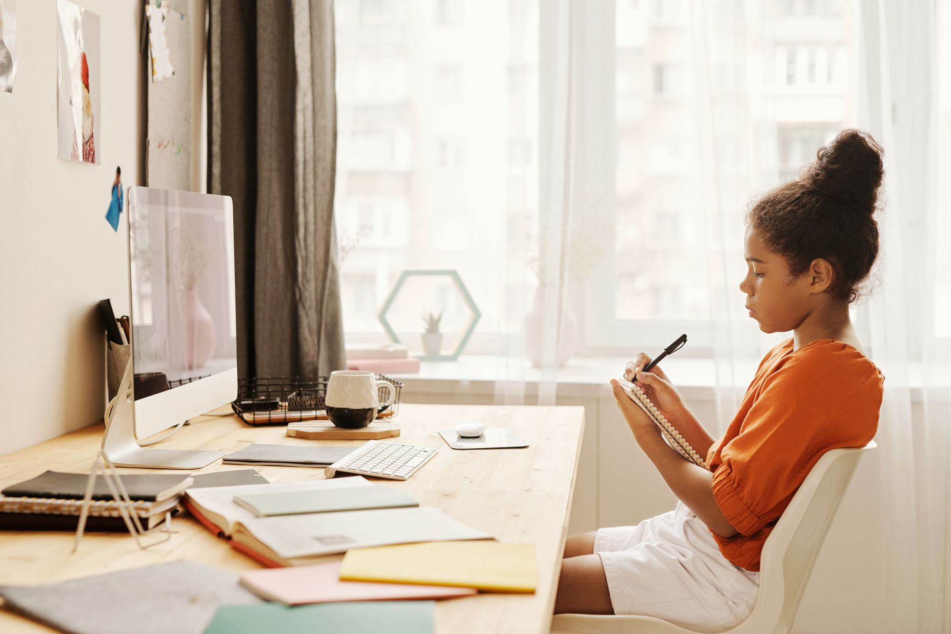 girl at home desk school work